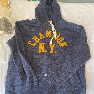 Vintage Navy Champion hoodie with yellow accents